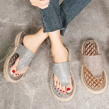 Load image into Gallery viewer, Overhead view of silver sandals with sparkle detailing and cushioned sole