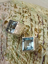 Load image into Gallery viewer, Blue Topaz sterling silver square stud earrings close-up – Merchant of Venus Jewellery