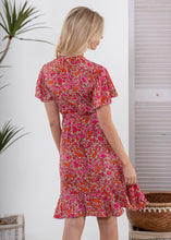 Load image into Gallery viewer, Bohemian knee-length wrap dress with fluted sleeves by Cienna Designs - Back view