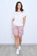 Load image into Gallery viewer, Styled outfit featuring pink linen shorts with white top