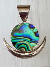 Load image into Gallery viewer, Handcrafted Sterling Silver New Moon pendant with Paua Shell by Emma Wardle.