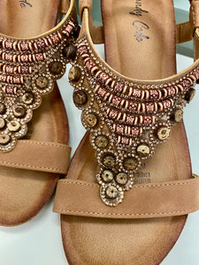 Close-up of beaded strap design on Wedge Beaded Sandals.