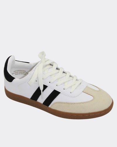 Women’s white sneakers with lightweight gum sole and laces