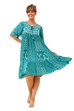 Load image into Gallery viewer, Relaxed-fit green boho babydoll dress with short sleeves and side pockets