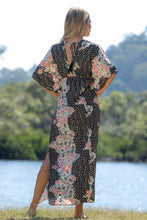 Load image into Gallery viewer, Back view of Venus Dress with tie and tassel detail