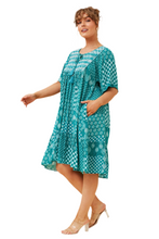 Load image into Gallery viewer, Side view of Honda Dress showing knee length and flowy silhouette