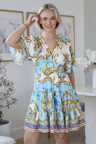 Ella Dress Blue – front view showing gold floral baroque print