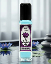 Load image into Gallery viewer, Bottle of 'Blue Lotus' by Spiritual Sky on a reflective surface with blurred background