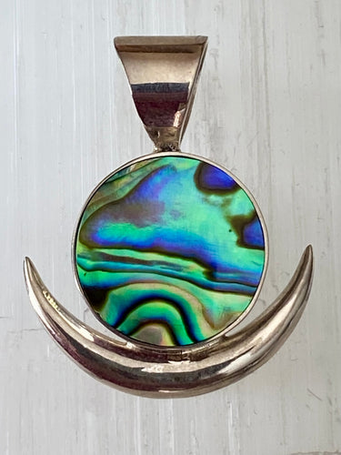 Handcrafted Sterling Silver New Moon pendant with Paua Shell by Emma Wardle.